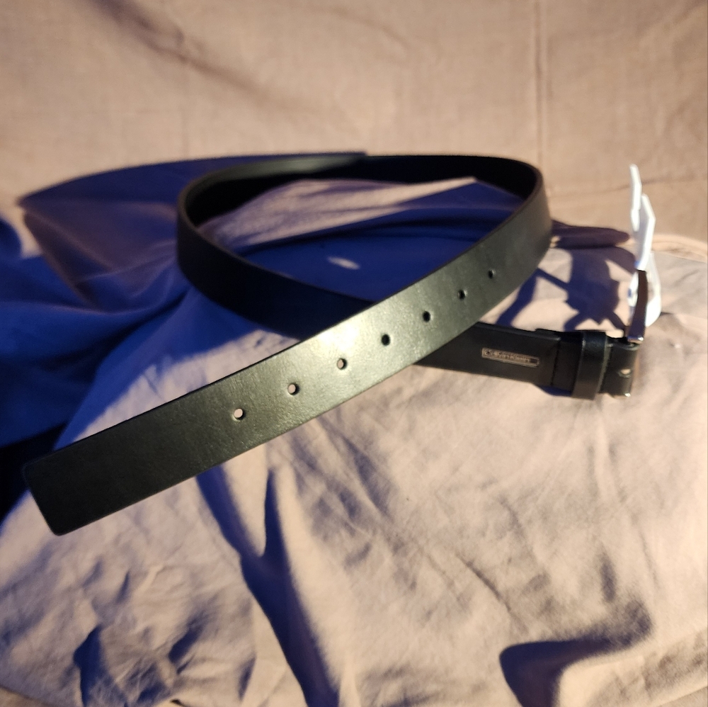 Calvin Klein synthetic leather black belt.